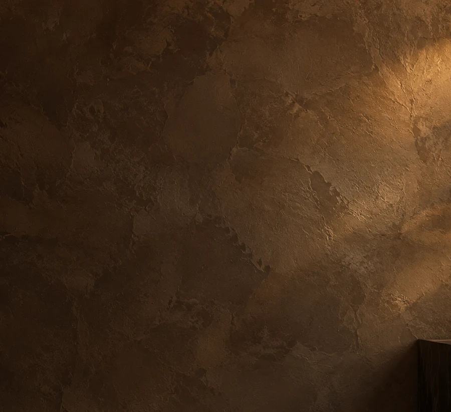 Close-up of warm, textured decorative stucco